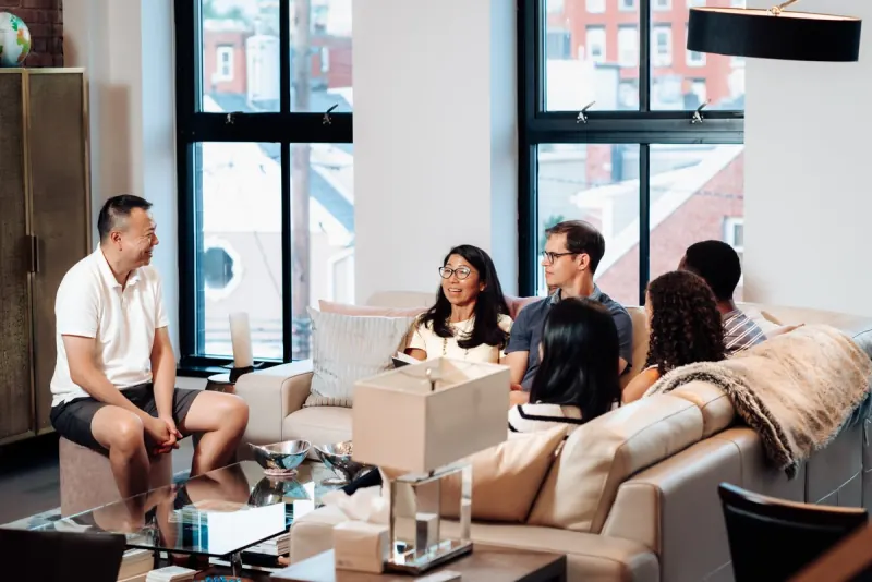 A Dinner Group gathered in a living room