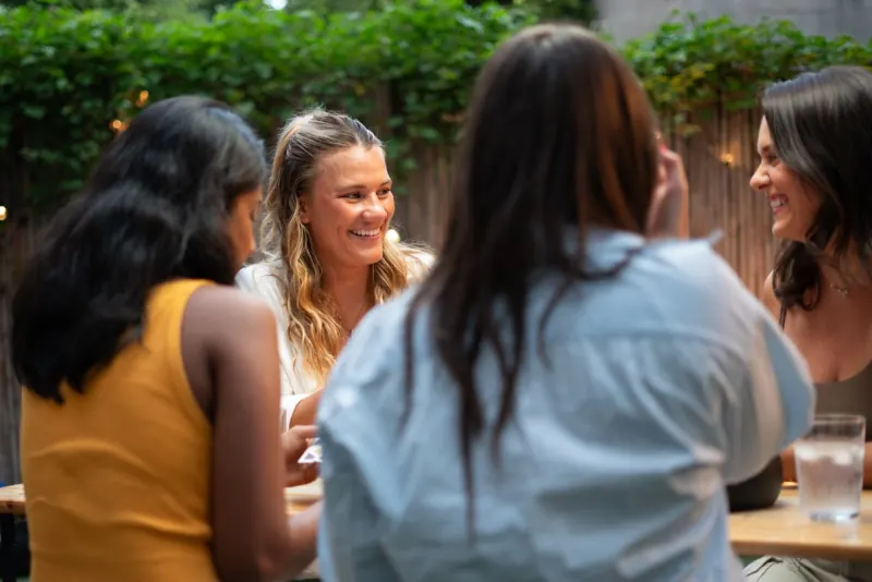 Women talking together outside