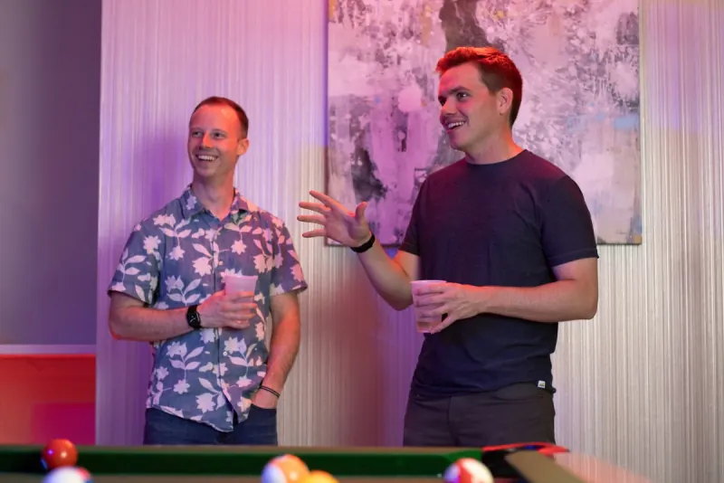 Men talking at a Dinner Group hangout