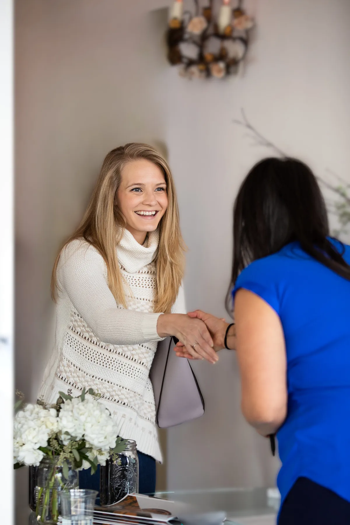 Person arriving and being welcomed at a Dinner Group